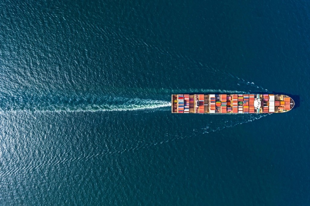 Aerial view of a container ship crossing the ocean