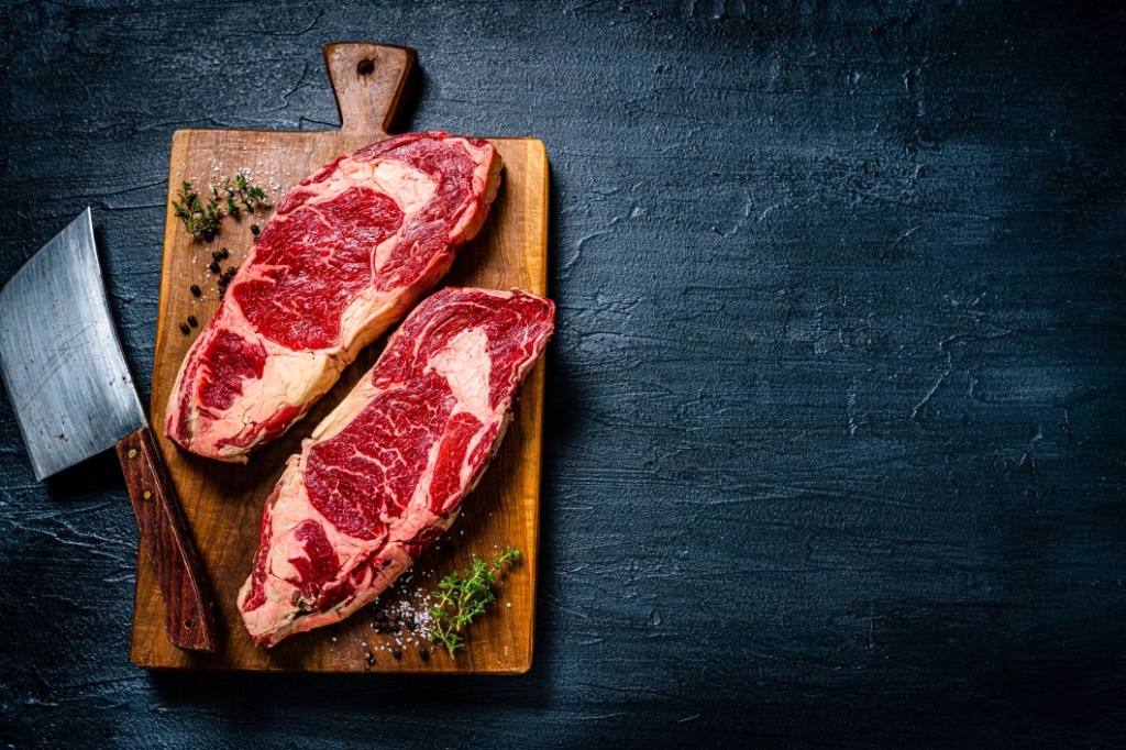 Premium cuts of beef on a butcher board